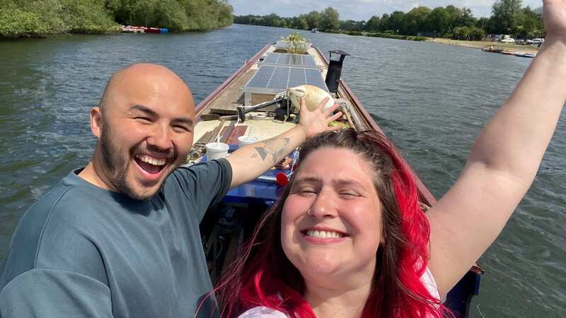 Amy Cross, 28, and her partner, Wes Arthur, 30, quit their old lives to live on a houseboat (Image: Boat Time / SWNS)