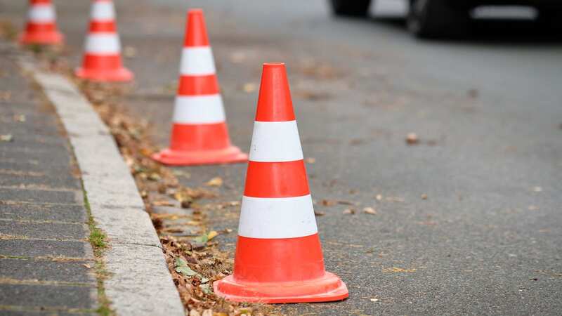 The neighbour put cones out into the road to save a parking space (stock photo) (Image: Getty Images/iStockphoto)