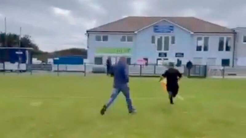 Furious dad chases referee across pitch after children