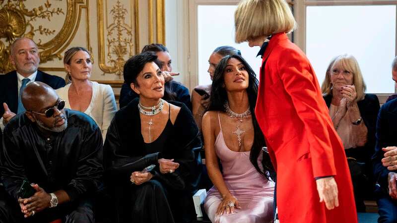 Anna Wintour appear to exchange some words with Kim Kardashian and Kris Jenner (Image: SplashNews.com)