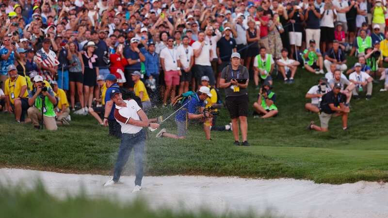 Rory McIlroy of Team Europe hits his shot on the 18th hole during the Ryder Cup