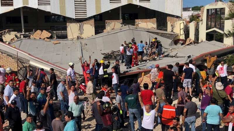At least nine dead in horror roof collapse during church baptism