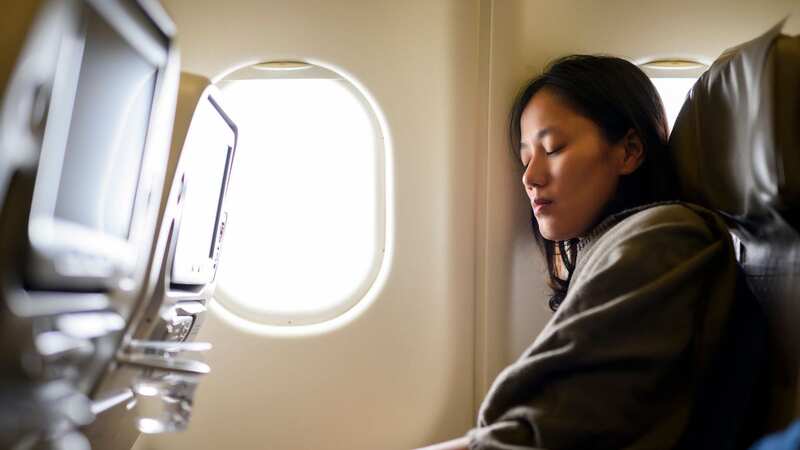 The dream sleep scenario on an economy flight is a nice wall to lean upon (Image: Getty Images)