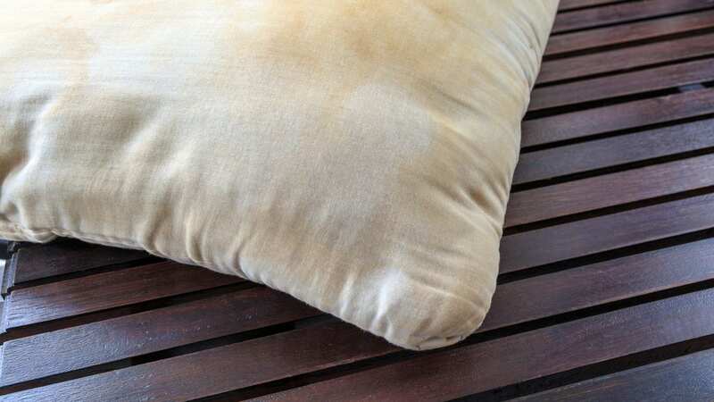 There is a quick and easy way to get rid of yellow stains on your pillows (Image: Getty Images/iStockphoto)