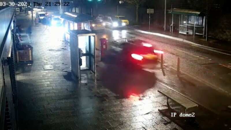 Moment wrong side driver smashes into bus stop - missing pedestrian by inches