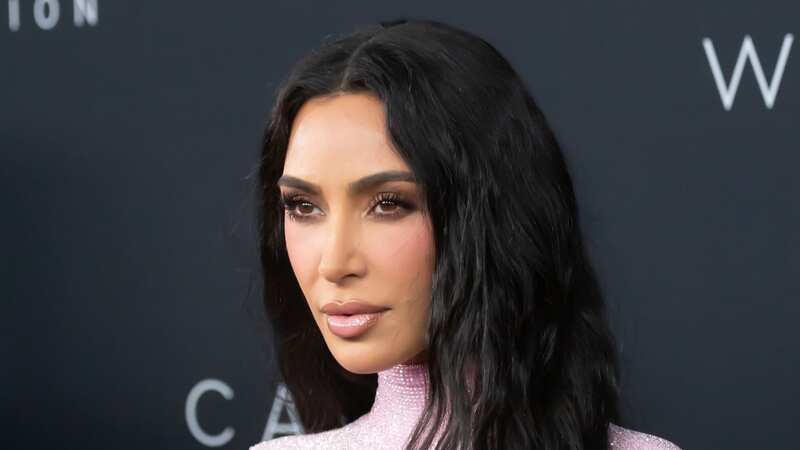 Kim Kardashian divides fans as she risks wardrobe malfunction in micro bra