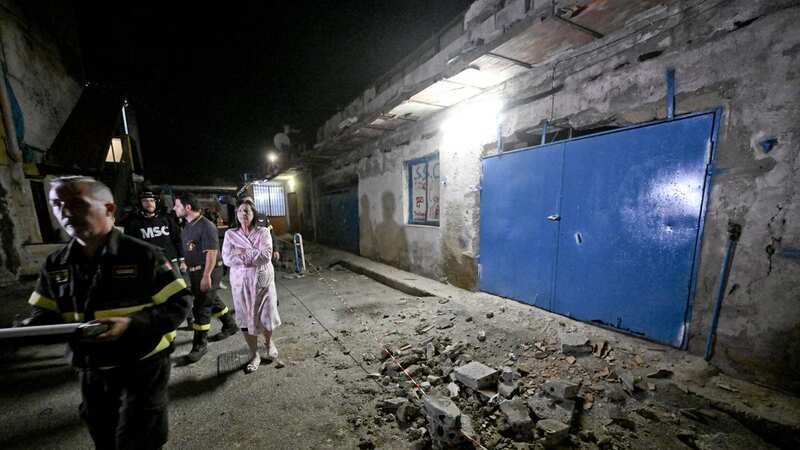 An area with fallen rubble is cordoned off following the tremors in Naples (Image: CIRO FUSCO/EPA-EFE/REX/Shutterstock)
