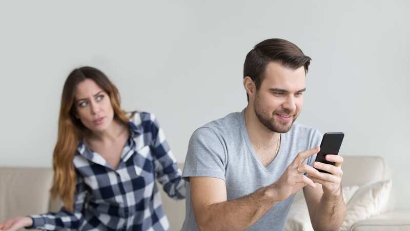 Could this one sentence mean your partner is cheating? (stock photo) (Image: Getty Images/iStockphoto)