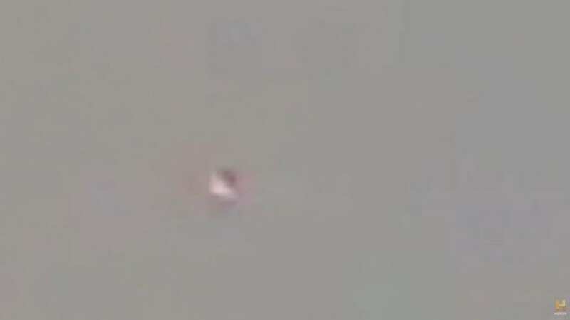 Chilling images of disc-shaped UFO seen by 12 airline staff as experts baffled