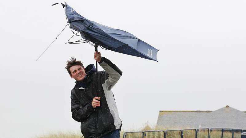 Brits have been urged to get out their umbrellas next week (Image: PA)