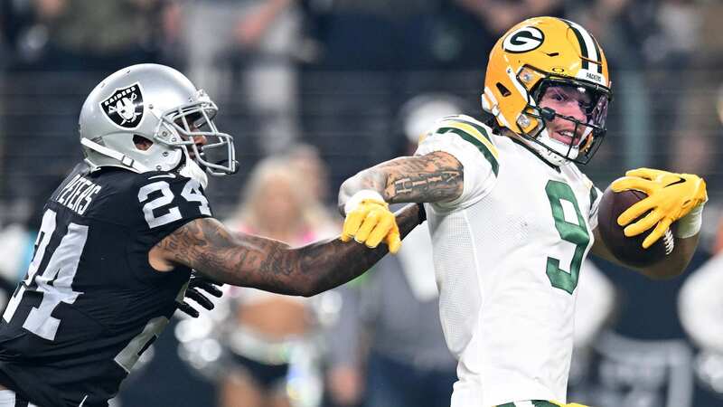 Christian Watson of the Green Bay Packers was tackled by Marcus Peters of the Las Vegas Raiders just before the endzone (Image: Candice Ward/Getty Images)
