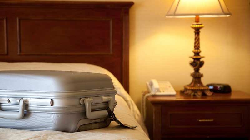 Martin warns that you should never put your bag on your hotel bed as it could transfer bugs to your home (Image: Getty Images)
