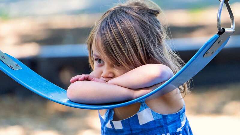 She was horrified when she saw a teacher pick her daughter up and try to cuddle her (Stock Photo) (Image: Getty Images)