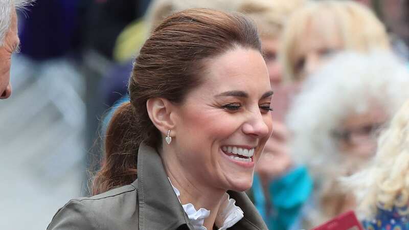 Kate burst into laughter chatting to some of the crowd (Image: PA)