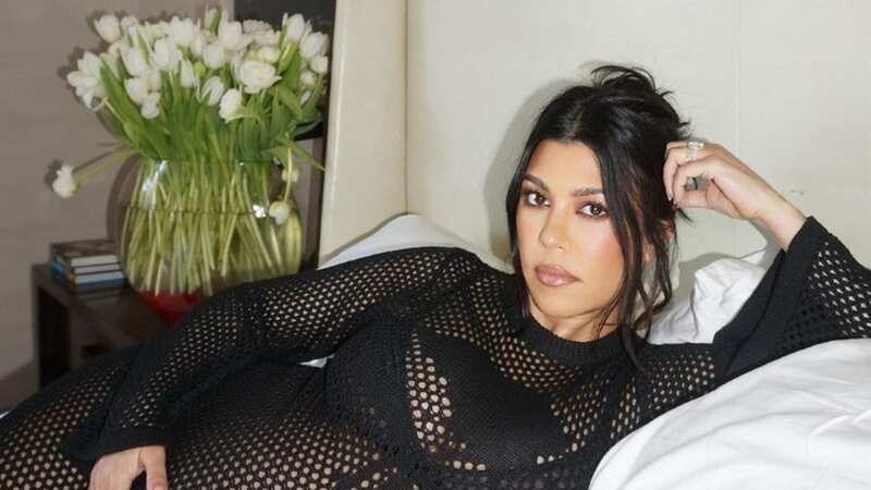 Pregnant Kourtney Kardashian wows in topless shoot as due date nears