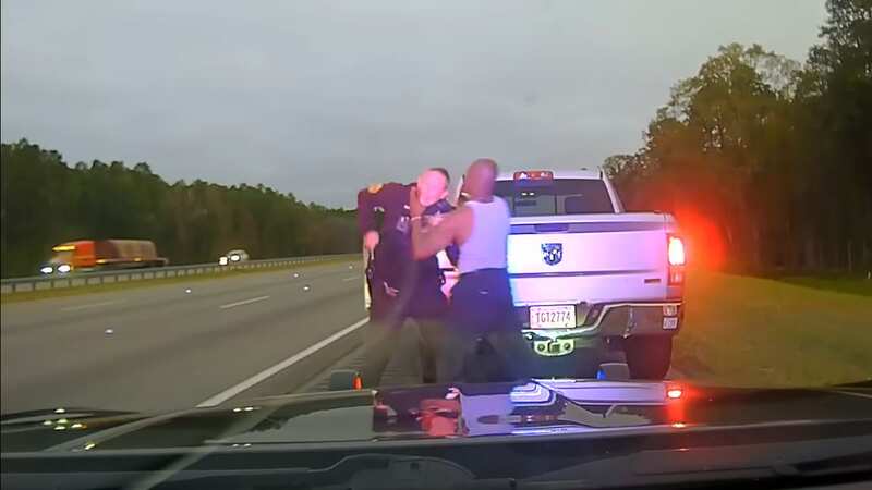 Horrific moment man is shot dead by police officer after roadside brawl