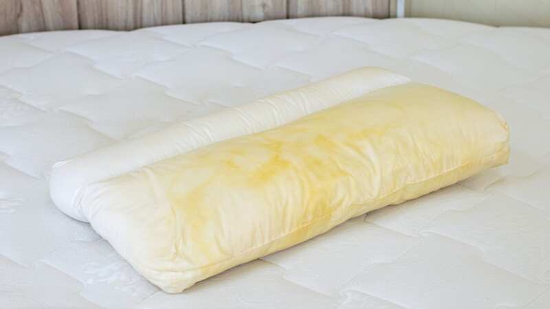 Bedroom experts have revealed how you can use white vinegar to remove yellow stains from pillowcases (Image: Getty Images/iStockphoto)