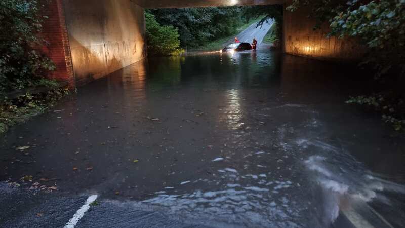 A flooded section of road in Derbyshire caught out a stranded motorist this morning