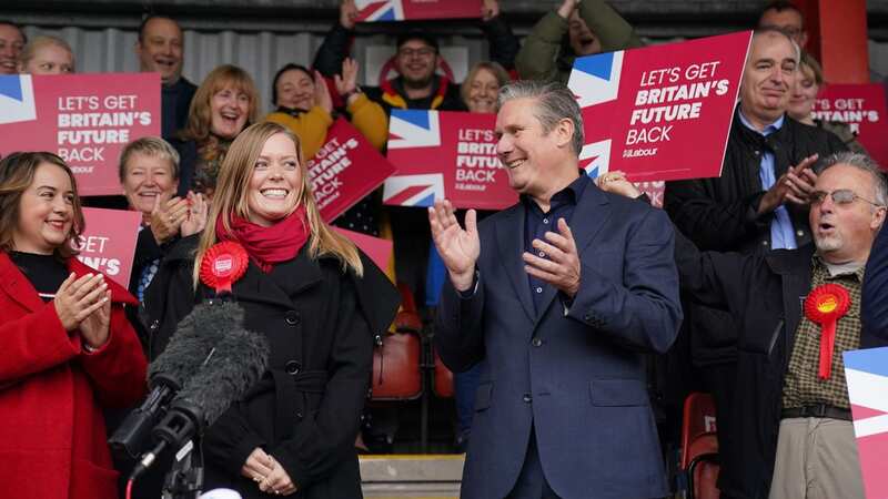Keir Starmer celebrated a win in Tamworth with new Labour MP Sarah Edwards (Image: PA)