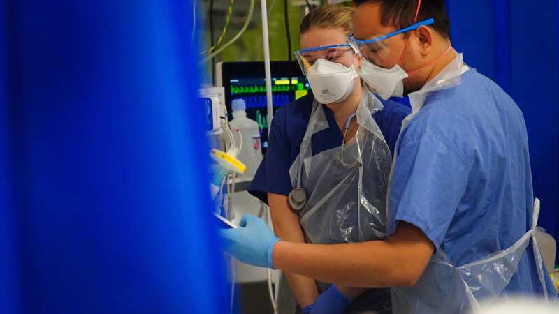 Medical staff wear at an NHS hospital (Image: PA)