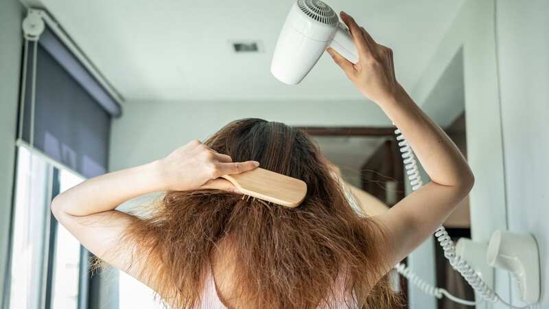 Hair expert, Carlos Atila, has shared a genius hack to get luscious waves in under one minute. (Image: Getty Images)