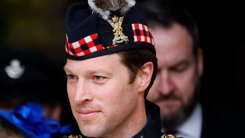 Lieutenant Colonel Johnny Thompson with King Charles (Image: Getty Images)
