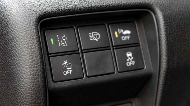 A close up shot of a modern car electronic safety systems control panel (stock photo) (Image: Getty Images)