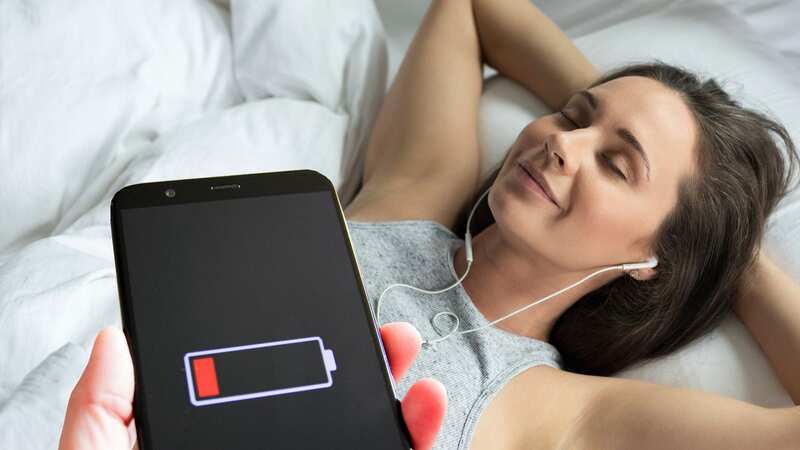 The iPhone has many built-in features and one we have all used is the clock app, but did you know it has the ability turn off your media? (Image: GettyImages)
