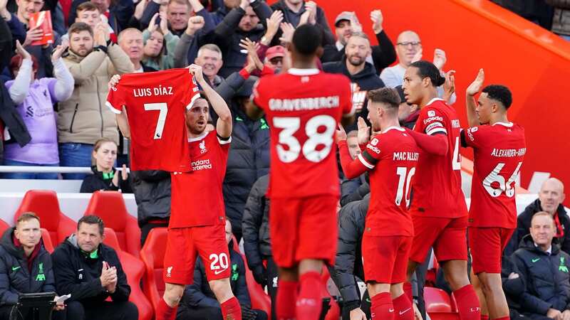 Jota held aloft Diaz