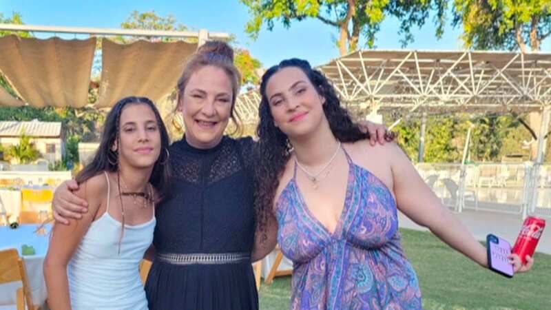 Lianne Sharabi with her daughters Yahel (left) and Noiya (right) (Image: FAMILY HANDOUT/UNPIXS)