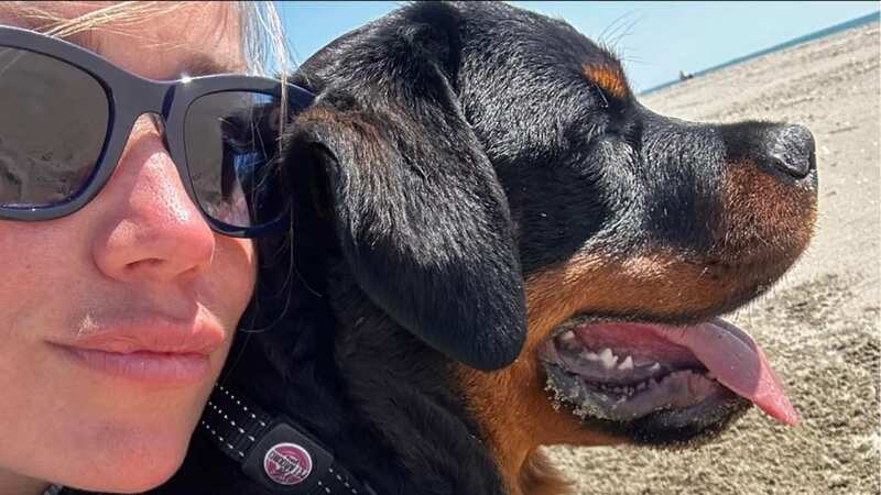 The dog, seen with owner Emilia Mikela Pawlak, fell from a third-floor balcony (Image: Facebook)