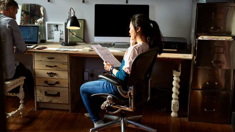 The average Brit sits for nine hours a day, according to the NHS (Image: Getty Images)