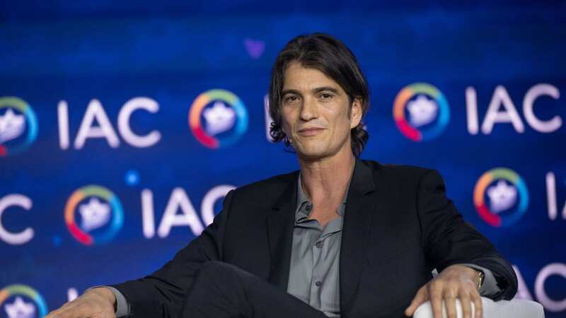 Israeli-American businessman Adam Neumann speaks during The Israeli American Council (IAC) 8th Annual National Summit on January 19, 2023 (Image: Getty Images)
