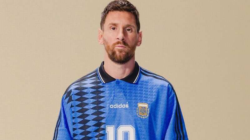 Messi wears the retro Argentina jersey