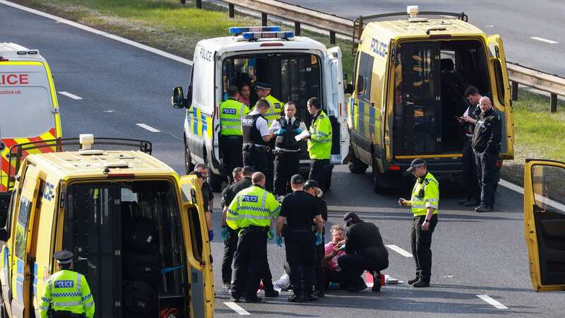 Protestors glued themselves to roads outside of Aintree on the day of the Grand National in April (Image: Liverpool Echo)