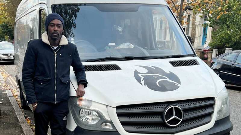 Dwight Henry with his seized van after losing nearly £50k of work contracts (Image: Dwight Henry / SWNS)