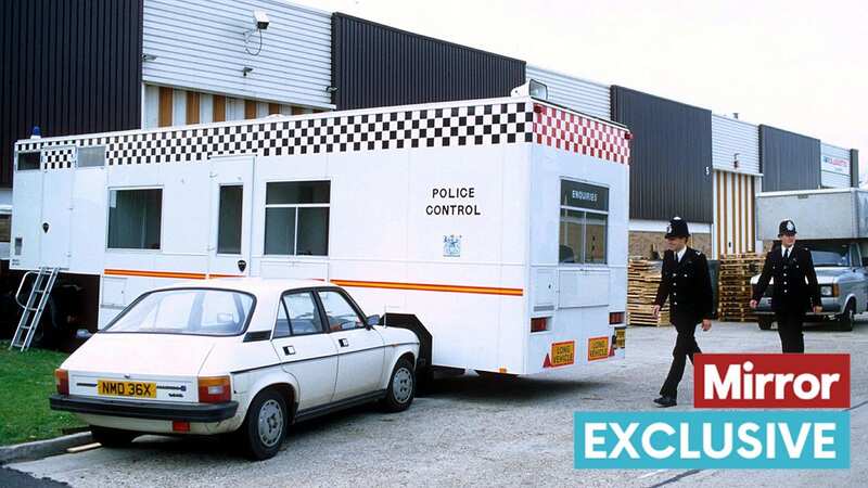 Police control van and officers at the site of the Brink