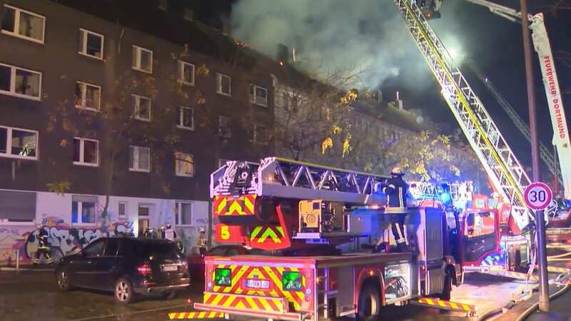 Firefighters attempt to put out fires at the flats owned by Chico (Image: Newsflash)