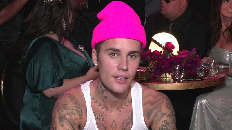 Justin Bieber divides fans as he wears jumper in strange way grabbing coffee