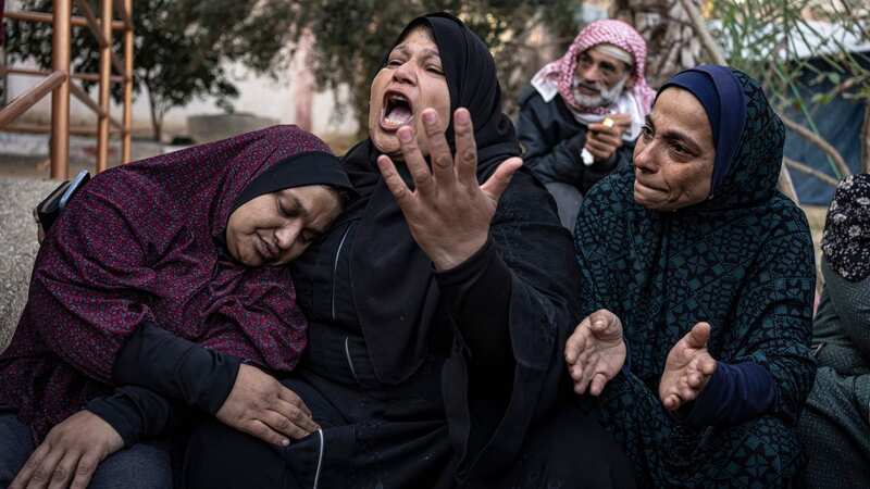 Palestinians are morning the loss of their relatives in the latest Israeli bombardment (Image: AP)