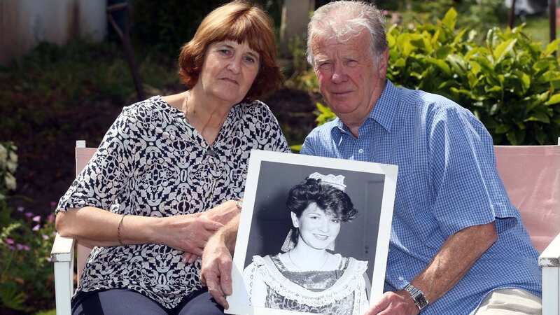 Roger Parrish, 80, and Pauline Murrell, 75, hold a picture of their daughter Joanna on the 25th anniversary of her murder (Image: Daily Mirror)