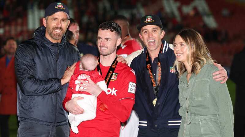 Anthony Forde and his family with Wrexham co-owners Ryan Reynolds and Rob McElhenney (Image: Getty Images)