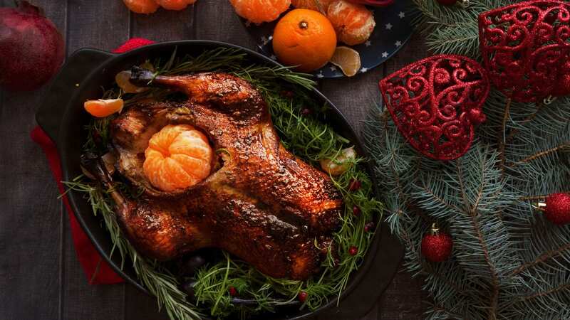 Roast Christmas duck with oranges and tangerines could the perfect dish for your table this Christmas (Image: Getty Images/iStockphoto)