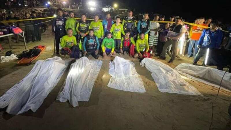 The recovered bodies of the family-of-five, who died "hugging each other" while sinking in quicksand (Image: Jam Press)