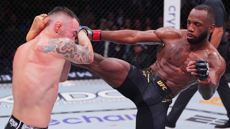 Leon Edwards lands on Colby Covington (Image: Zuffa LLC via Getty Images)