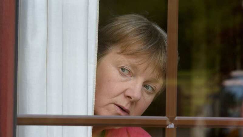 The intrusive neighbour had been spying on the couple (stock photo) (Image: Getty Images/iStockphoto)