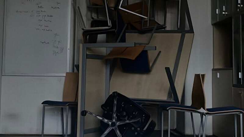 Furniture stacked up in front of a door at Charles University (Image: X)