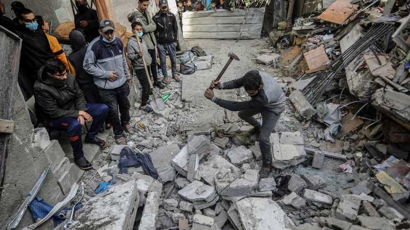 Palestinians wounded on Christmas eve are brought to the hospital (Image: AP)