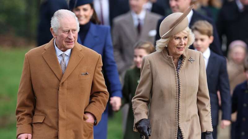 King Charles and wife Camilla on Christmas Day (Image: AFP via Getty Images)