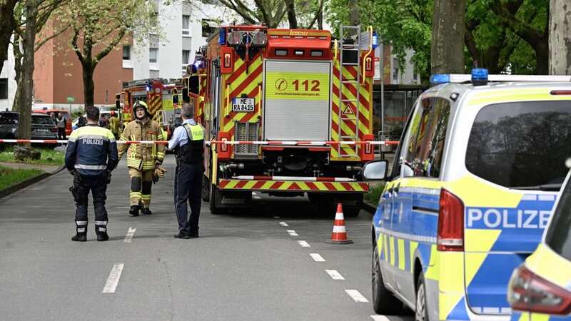 Police cars and fire engines arrive at the scene